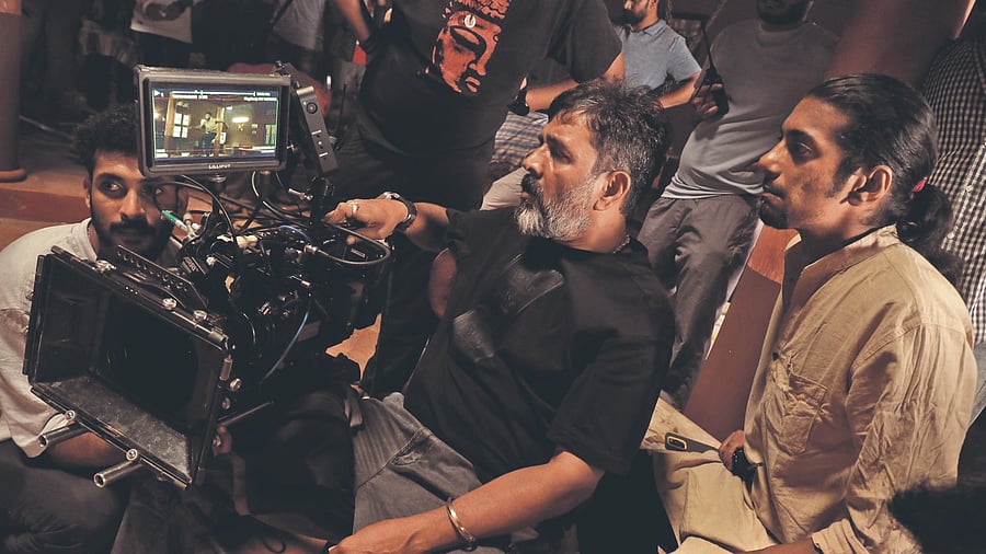 <div class="paragraphs"><p>Lead Action director Ravi Varma (sitting, black T-shirt) and director Viveka review a shot.</p></div>