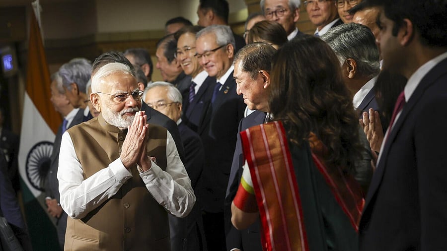 <div class="paragraphs"><p> Prime Minister Narendra Modi with his Japanese counterpart Shigeru Ishiba.</p></div>