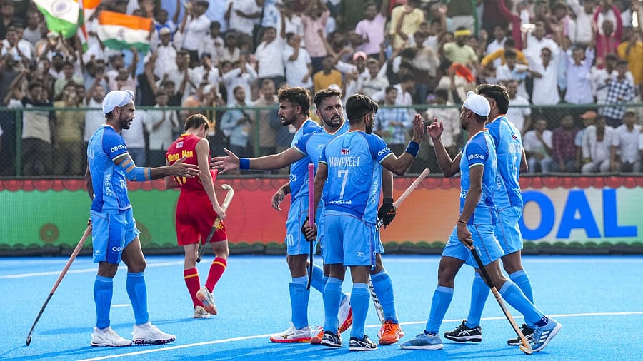<div class="paragraphs"><p>Harmanpreet Singh celebrates with team-mates after the win.</p></div>