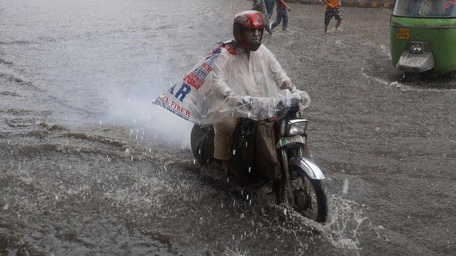 <div class="paragraphs"><p>A man rides a motorcycle on a flooded road in Lahore, Pakistan, August 30, 2025.</p></div>