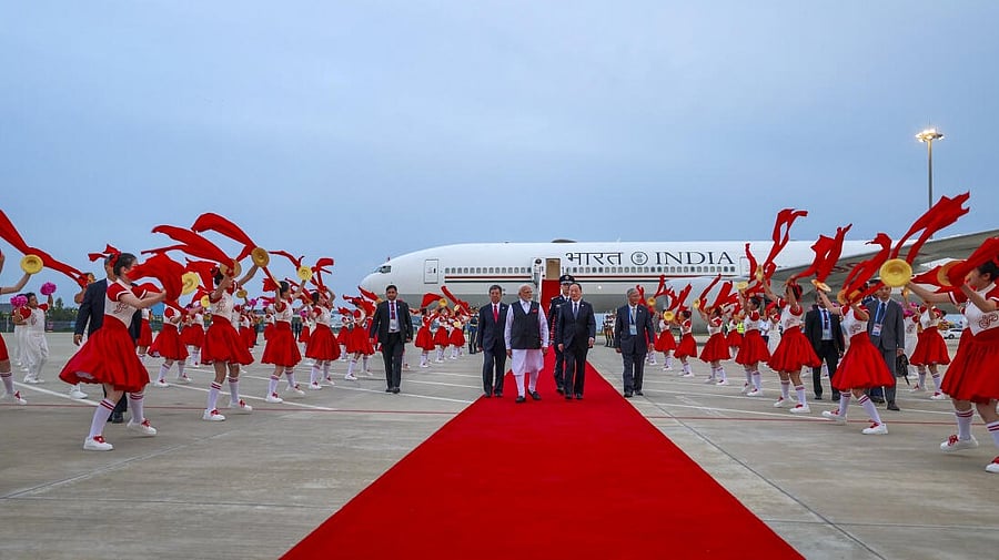 <div class="paragraphs"><p>In this image posted on Aug. 30, 2025, Prime Minister Narendra Modi being welcomed with a performance by artistes upon his arrival at the airport, in Tianjin, China.</p></div>