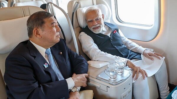 <div class="paragraphs"><p>Prime Minister Narendra Modi along with his Japanese counterpart Shigeru Ishiba takes a ride on a bullet train, in Japan.</p></div>