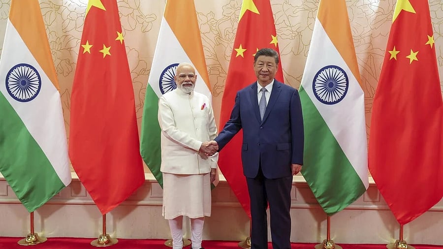 <div class="paragraphs"><p>Prime Minister Narendra Modi shakes hands with Chinese President Xi Jinping during a meeting on the sidelines of Shanghai Cooperation Organisation (SCO) Summit in Tianjin, China.</p></div>