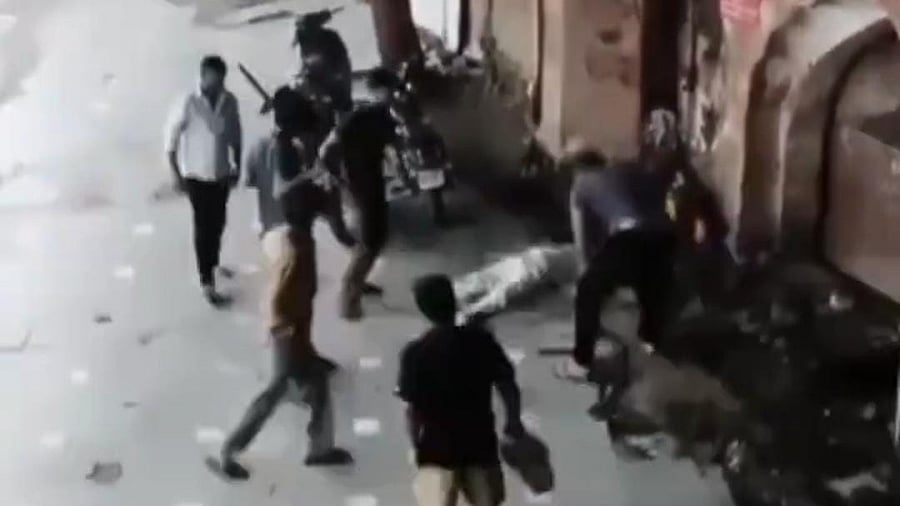 <div class="paragraphs"><p>A screengrab of the CCTV footage outside the temple showing the assault.</p></div>