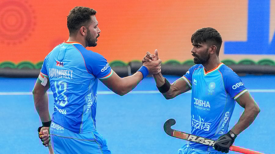 <div class="paragraphs"><p>India’s Harmanpreet Singh (left) celebrates with Sumit after against Japan during their Asia Cup game in Rajgir on Sunday. </p></div>