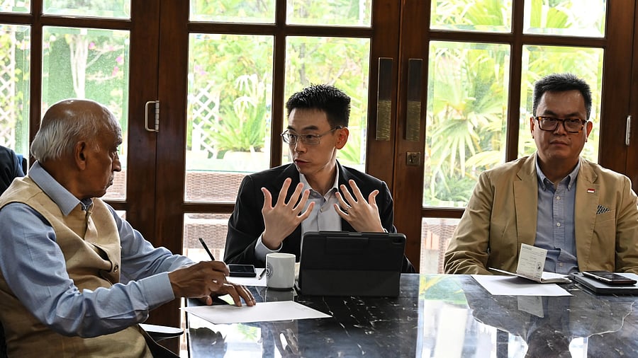 <div class="paragraphs"><p>Jonathan Hung, Executive Director at the Office for Space Technology and Industry (OSTIn), Singapore, during the interaction in Bengaluru on Monday. AS Kiran Kumar, Former Isro Chairman, and Edgar Pang, Consul General, Consulate-General of Singapore, also seen. </p></div>