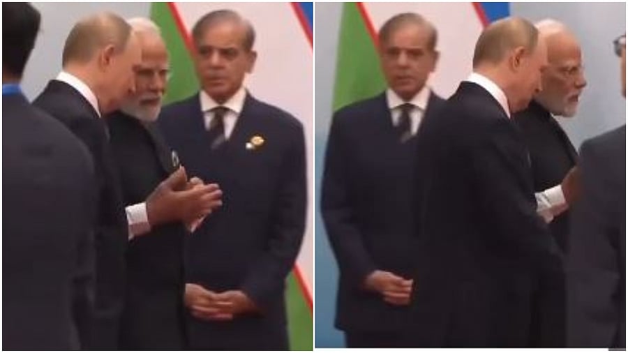 <div class="paragraphs"><p>Pakistan PM Shehbaz Sharif Watches as PM Modi and President Putin pass by.</p></div>