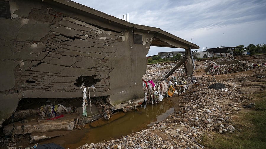 <div class="paragraphs"><p>Remains of a damaged house at a flood ravaged area after heavy rainfall, at Chatha, in Jammu district</p></div>