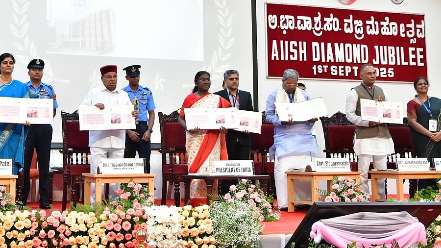 <div class="paragraphs"><p>President Droupadi Murmu releases the postal cover to mark the diamond jubilee celebrations of All India Institute of Speech and Hearing in Mysuru, on Monday.</p></div>