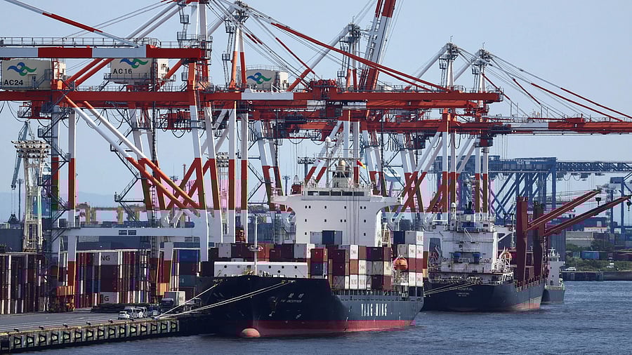 <div class="paragraphs"><p>A cargo ship carrying containers is seen at an industrial port within Tokyo Port, Japan </p></div>
