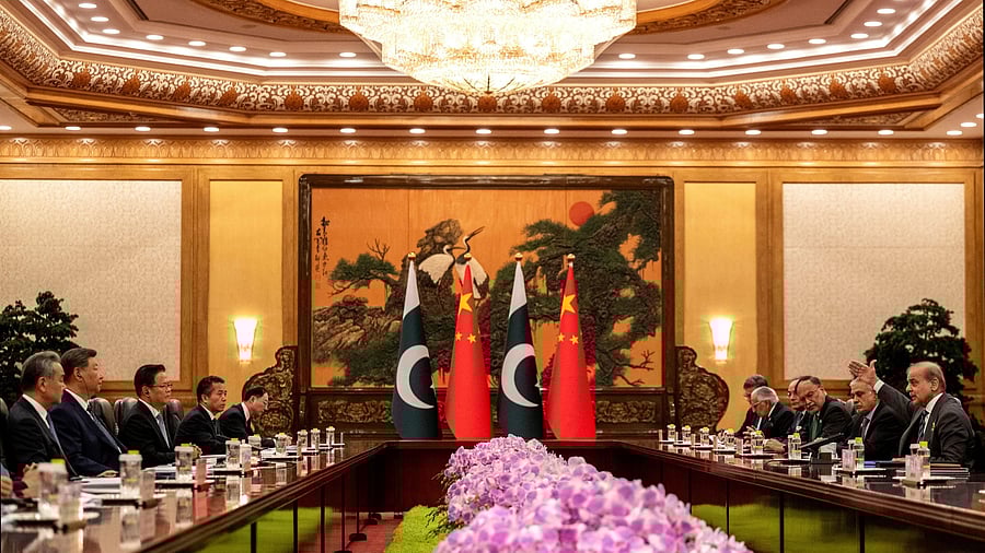 <div class="paragraphs"><p>Pakistan Prime Minister Shehbaz Sharif gestures as he speaks at the beginning of a meeting with Chinese President Xi Jinping,in Beijing, China.</p></div>