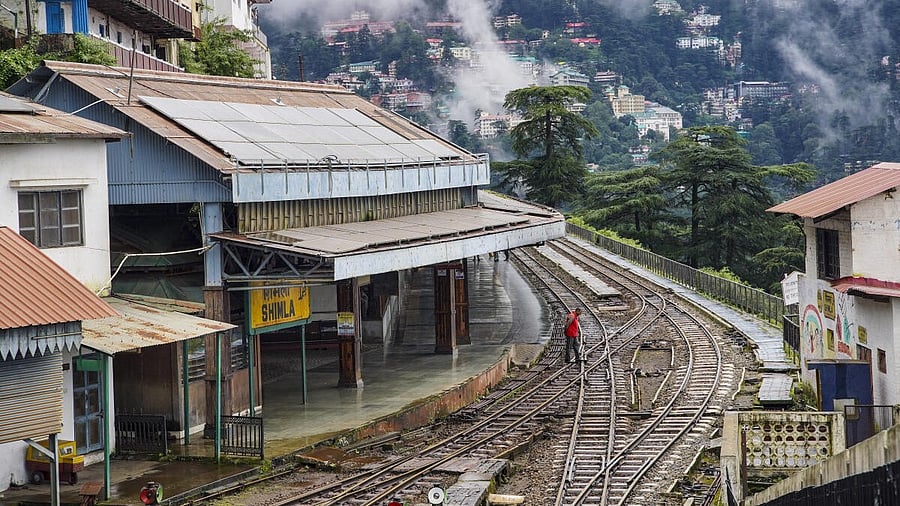 <div class="paragraphs"><p>A man on tracks as train services on the Kalka-Shimla railway have been suspended following landslides, in Shimla, Tuesday, Sep. 02, 2025. </p></div>
