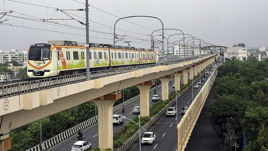 <div class="paragraphs"><p>A metro train runs on its track, in Nagpur.</p></div>