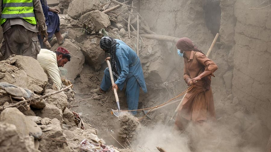 <div class="paragraphs"><p>Rescue workers search for victims amidst debris of a damaged house after a deadly magnitude-6 earthquake that struck Afghanistan on Sunday, in Mazar Dara, Kunar province, Afghanistan, September 2, 2025.</p></div>