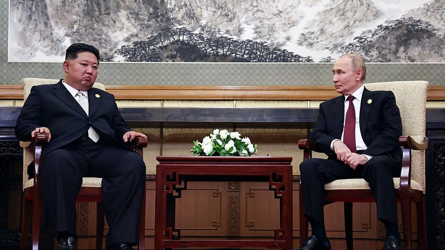 <div class="paragraphs"><p>Russian President Vladimir Putin and North Korean leader Kim Jong Un attend a meeting in Beijing, China.</p></div>
