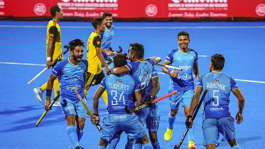 <div class="paragraphs"><p>India's players celebrate after scoring a goal during their Super 4s match against Malaysia in Men's Asia Cup in Rajgir on Thursday. </p></div>