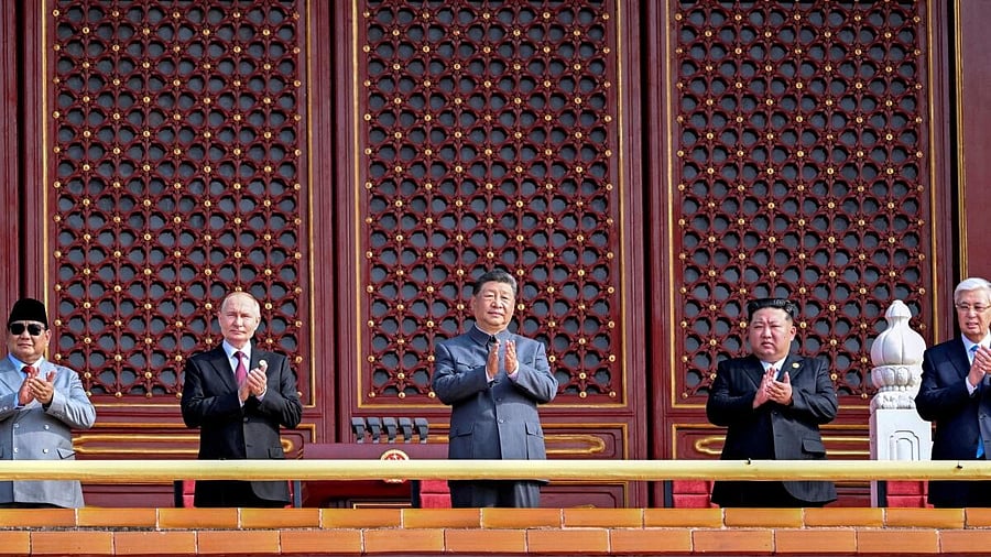 <div class="paragraphs"><p>North Korean leader Kim Jong Un and Russian President Vladimir Putin attend a military parade marking the 80th anniversary of the end of World War Two, in Beijing.</p></div>