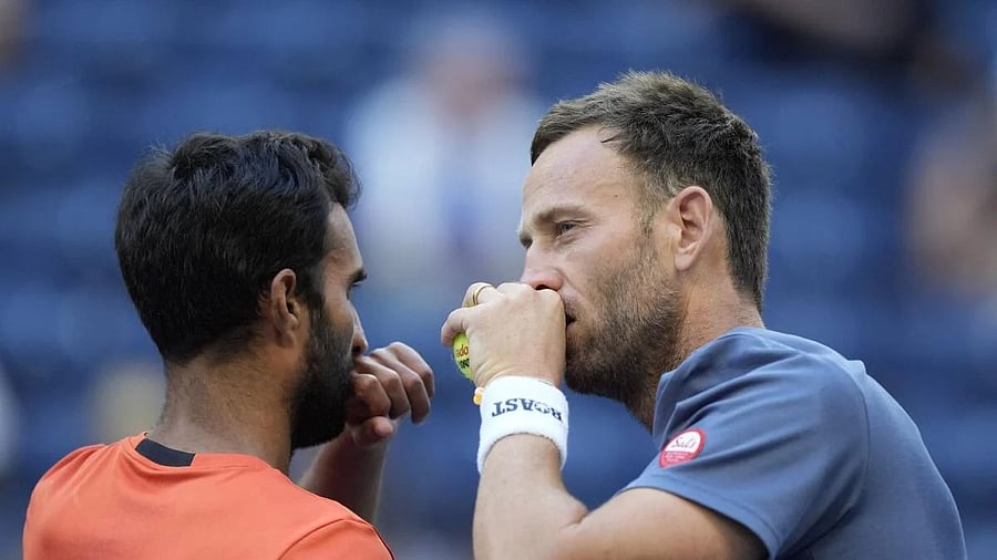 <div class="paragraphs"><p> New Zealand's Michael Venus and India's Yuki Bhambri.</p></div>
