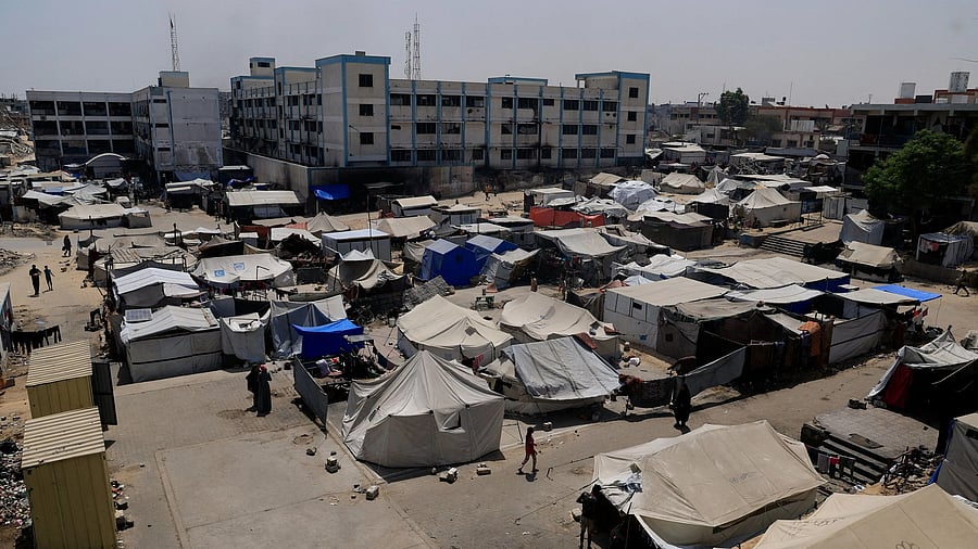 <div class="paragraphs"><p>Palestinians displaced by the Israeli military offensive shelter in an UNRWA school, in Khan Younis, in the southern Gaza Strip.</p></div>
