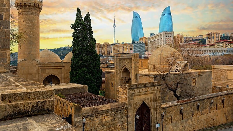 <div class="paragraphs"><p>View of the historical mosques and the walls of Shirvanshahs palace in the Old town, and modern glass Flame Towers in the background. </p></div>