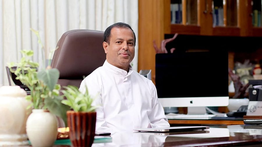 <div class="paragraphs"><p>Augustine George</p></div>