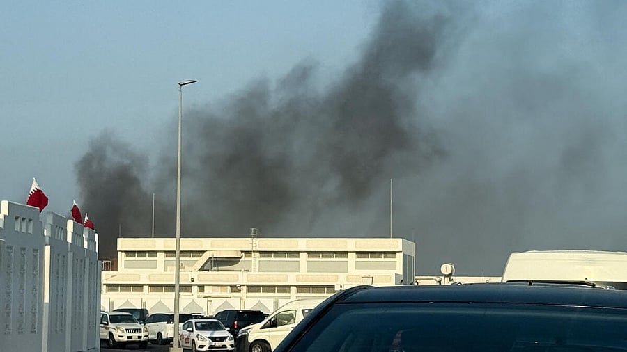 <div class="paragraphs"><p>Smoke rises after several blasts were heard in Doha.</p></div>