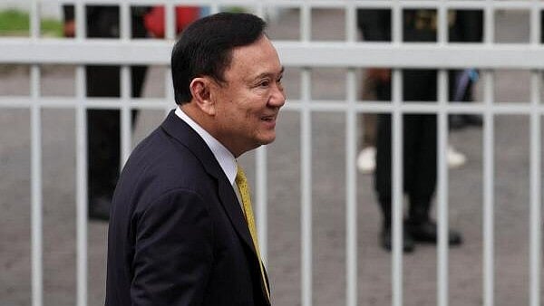 <div class="paragraphs"><p>Former Thai Prime Minister Thaksin Shinawatra arrives at the Supreme Court ahead of a verdict.</p></div>