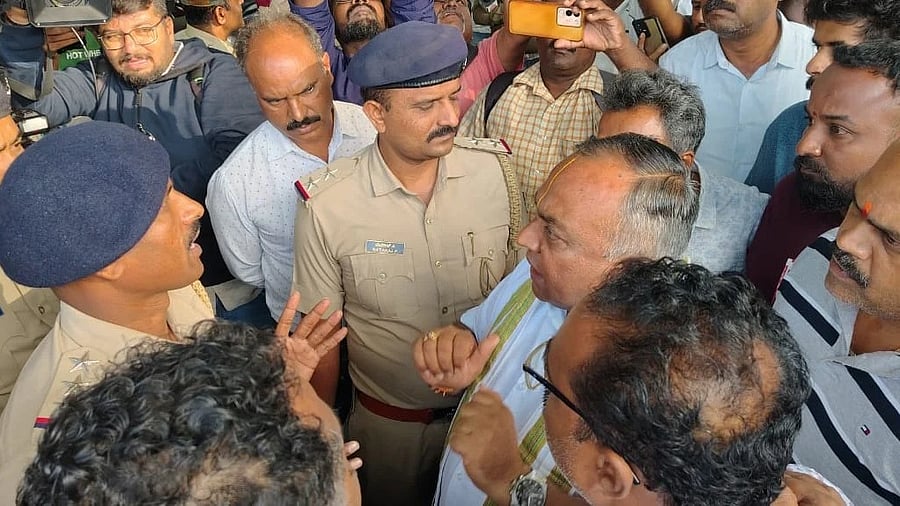 <div class="paragraphs"><p>TS Srivathsa, MLA, questioning the police over their action in Mysuru on Tuesday.</p></div>