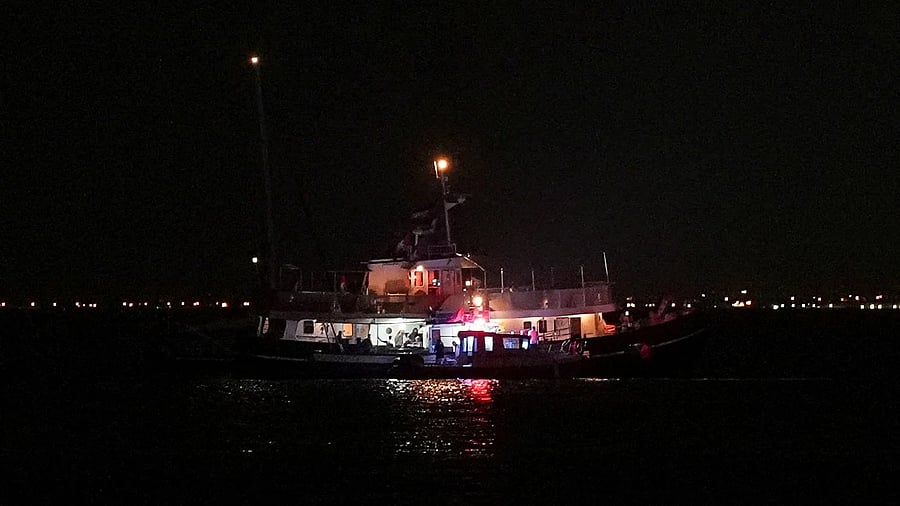 <div class="paragraphs"><p>A Global Sumud flotilla vessel floats in the waters as Tunisian Maritime National Guard boats conduct an inspection in Sidi Bou Said, Tunisia.</p></div>
