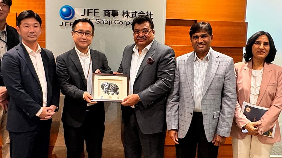 <div class="paragraphs"><p>M B Patil with JFE Shoji's representatives.&nbsp;</p></div>