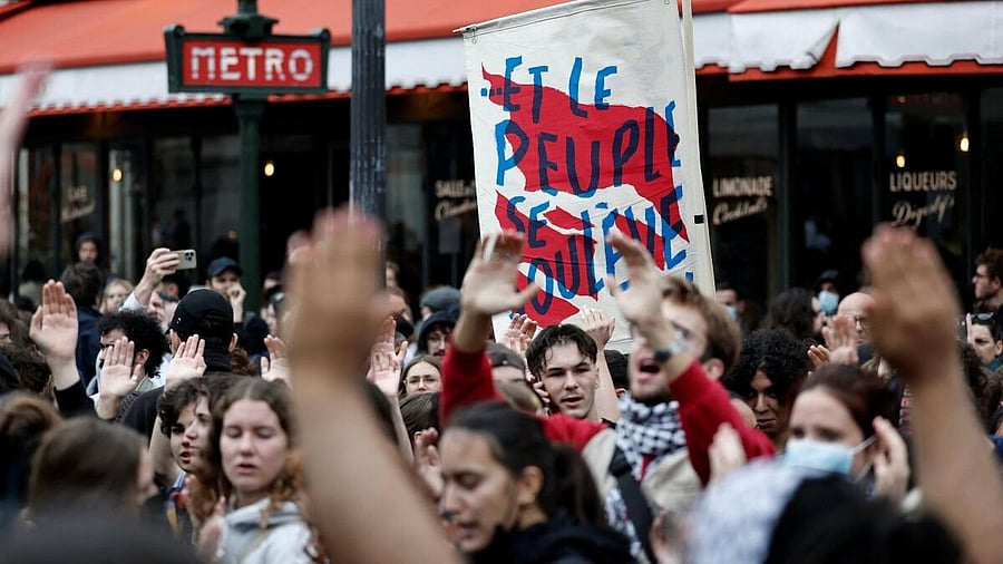 <div class="paragraphs"><p>Protesters raise their hands during a demonstration near the Gare du Nord train station during a day of protests in Paris as part of a grassroots protest movement called "Bloquons Tout" ("Let's Block Everything") calling for nationwide all-day disruptions, France.</p></div>