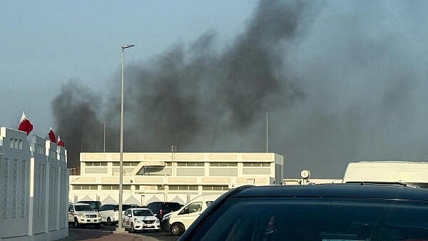 <div class="paragraphs"><p>Smoke rises after several blasts were heard in Doha</p></div>
