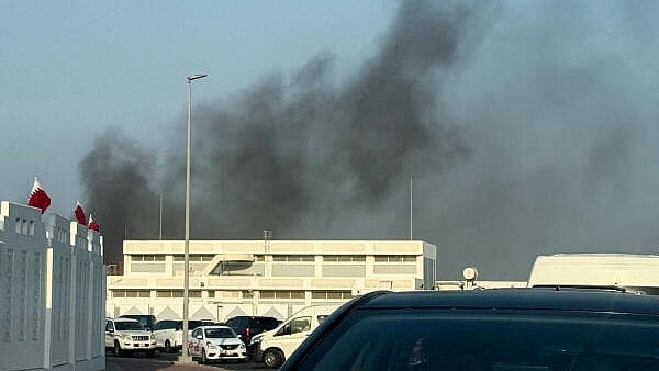 <div class="paragraphs"><p>Smoke rises after several blasts were heard in Doha, Qatar.</p></div>