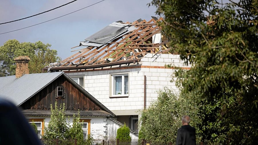 <div class="paragraphs"><p>Soldiers patrol the street, following violations of Polish airspace during a Russian attack on Ukraine, in Wyryki.</p></div>