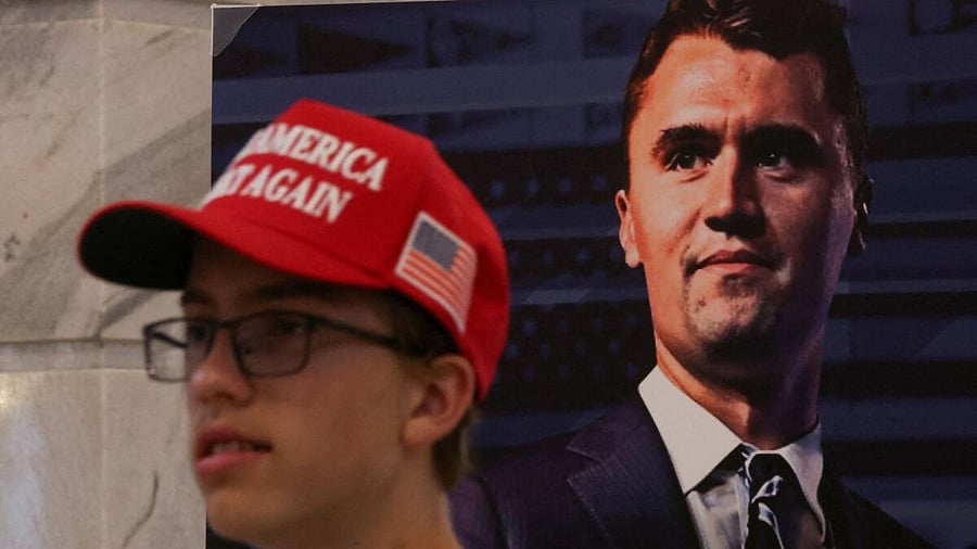 <div class="paragraphs"><p>A poster of US right-wing activist, commentator, Charlie Kirk, an ally of US President Donald Trump, who was fatally shot during an event at Utah Valley University, as people attend a vigil for him at the Utah State Capitol, in Salt Lake City, Utah, US.</p></div>