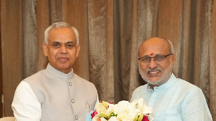 <div class="paragraphs"><p>Acharya Devvrat greeting C P Radhakrishnan after the latter was elected as new Vice President</p></div>