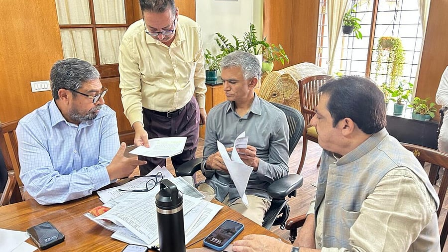 <div class="paragraphs"><p>Naseer Ahmed, MLC, and Ministers Krishna Byre Gowda and B.Z. Zameer Ahmed Khan during a meeting in Bengaluru on Thursday.</p></div>