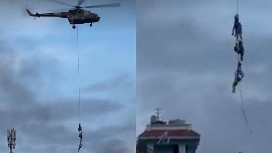 <div class="paragraphs"><p>Politicians clung onto the helicopters where demonstrators rushed to catch hold of them and tried to attack them as they took off.</p></div>