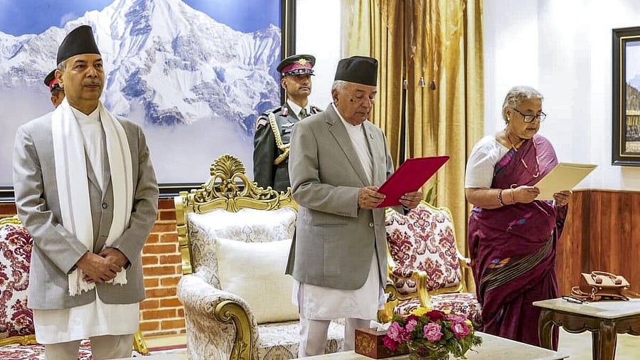 <div class="paragraphs"><p>In this image received on Sept. 12, 2025, Nepal's President Ramchandra Paudel administers the oath of office to Sushila Karki as Prime Minister during a ceremony at the President's residence, in Kathmandu, Nepal.</p></div>