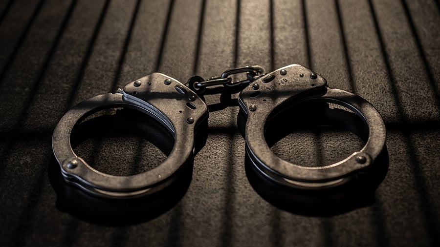 <div class="paragraphs"><p>Image of handcuffs representing arrest.</p></div>