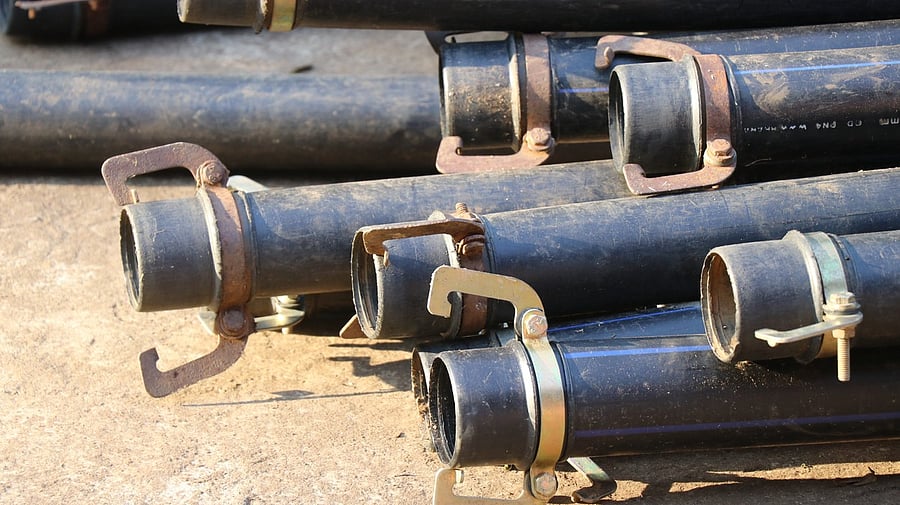 <div class="paragraphs"><p>Group of HDPE pipe with metal clamps.</p></div>