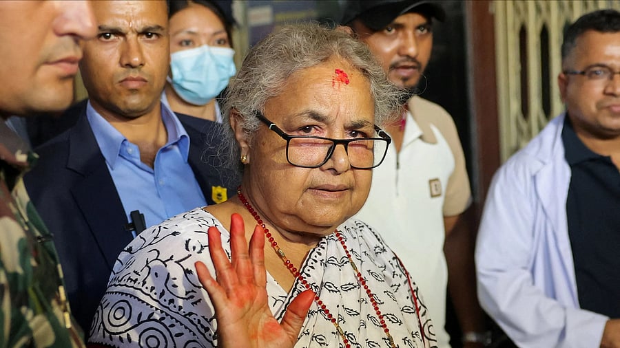 <div class="paragraphs"><p>Newly sworn-in  Nepal’s interim Prime Minister, Sushila Karki, arrives at a hospital to meet the victims of Monday’s deadly anti-corruption protests, in Kathmandu, Nepal.</p></div>