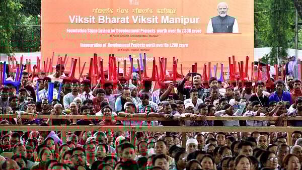 <div class="paragraphs"><p>People brave rains and slush in strife-torn Manipur to hear PM Modi.</p></div>