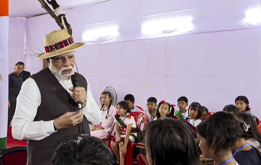 <div class="paragraphs"><p>Prime Minister Narendra Modi&nbsp;interacting with&nbsp;violence-affected people at a relief camp in Churachandpur in Manipur on Saturday. </p></div>