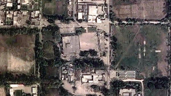 <div class="paragraphs"><p>A satellite image shows Markaz Taiba following airstrikes in Muridke, Pakistan.</p></div>