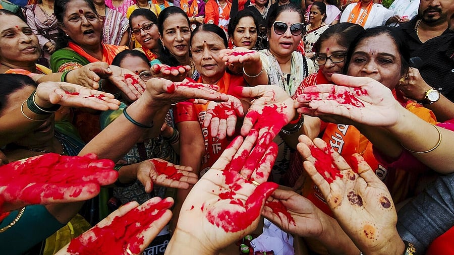 <div class="paragraphs"><p>Shiv Sena (UBT) workers show their sindoor-smeared hands during a protest against the India-Pakistan Asia Cup cricket match, in Navi Mumbai, Sunday, Sept. 14, 2025.</p></div>