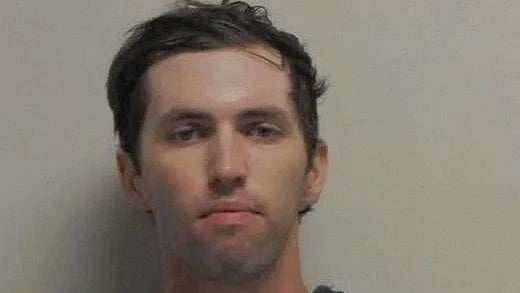 <div class="paragraphs"><p>A police mugshot shows Tyler Robinson.</p></div>