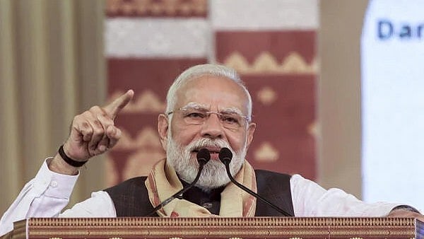 <div class="paragraphs"><p>Prime Minister Narendra Modi addresses a gathering in Darrang, Assam.</p></div>
