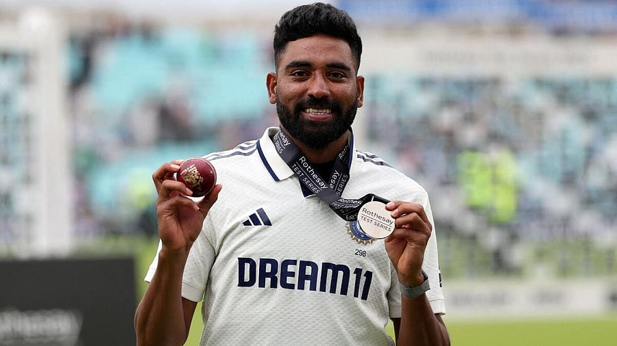 <div class="paragraphs"><p>Mohammed Siraj poses after winning the player of the match award after India won the match to draw the test series.</p></div>