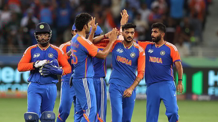 <div class="paragraphs"><p>India's Axar Patel celebrates with teammates.</p></div>